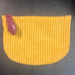 Two colored Ipsy cosmetic bag